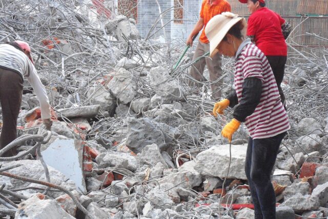 Metal rebar reclamation for recycling at building demolition site - 04